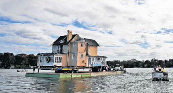 first part of the capen house floated across the water