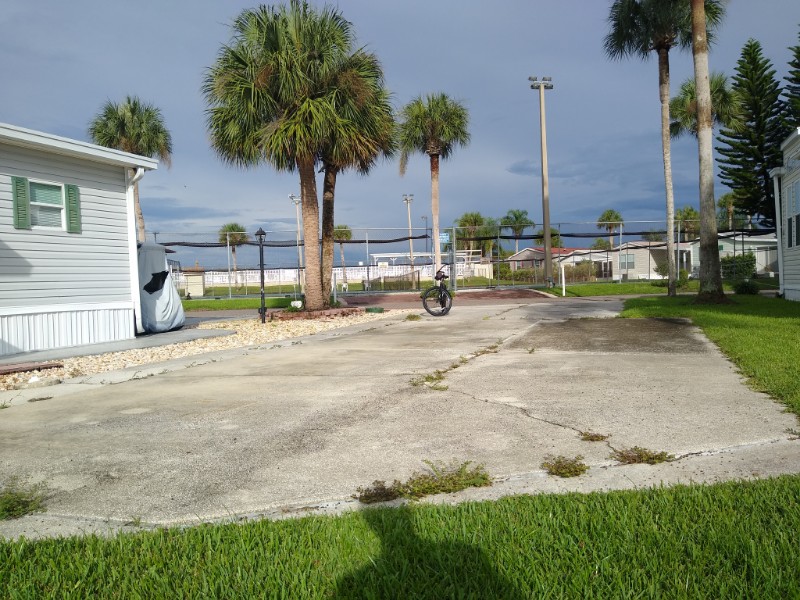 Showing the entire concrete pad, looking toward the tennis courts.